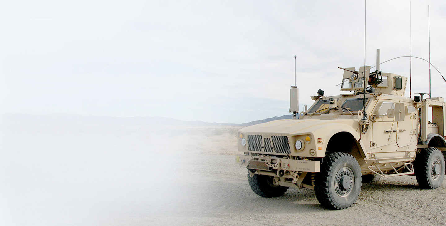 Mine-Resistant, Ambush-Protected (MRAP) parked in the desert 