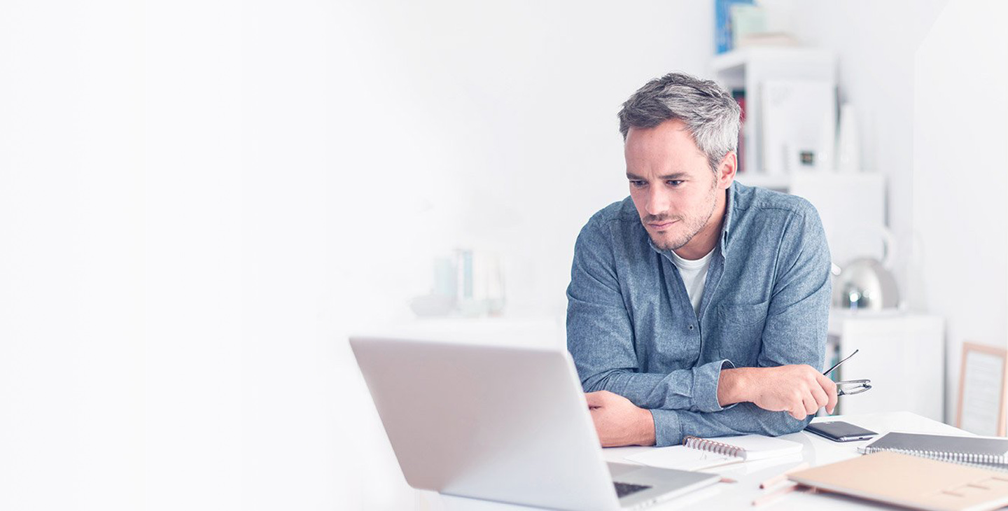 Man looking at laptop