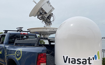 The mobile Viasat and Amazon Web Service connectivity solution consisting of an antenna, mobile dish,  hardware for the Net Agility software to run on, and ELITE peripherals — deployed on a pickup truck 