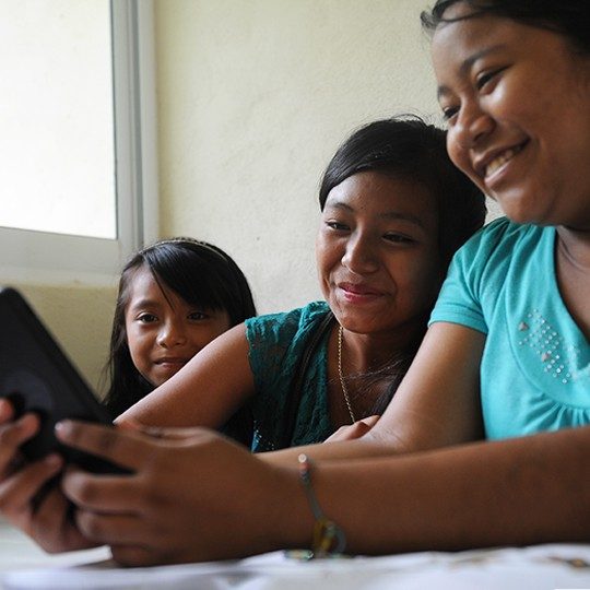 Yound women connect through community wi-fi