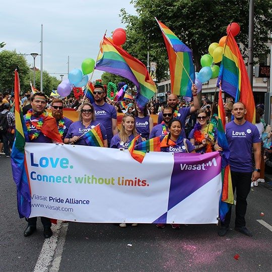 Viasa Pride Alliance members holding a banner at a Gay Pride event