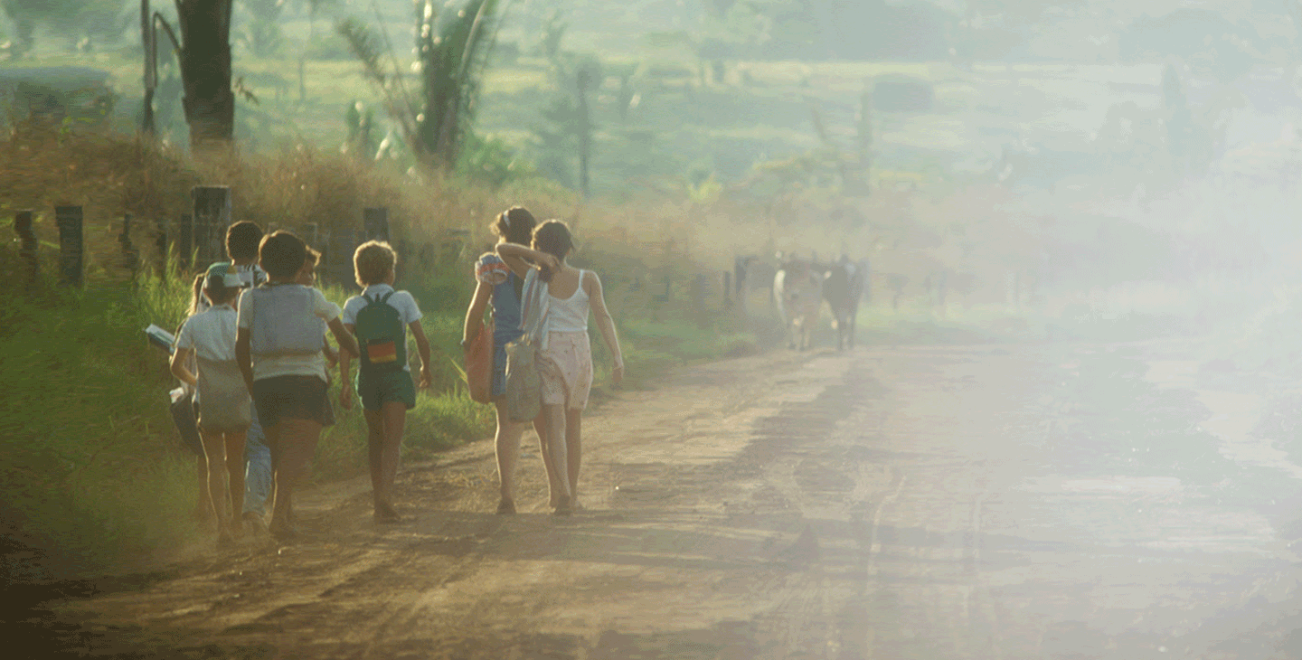 Children on a remote country road walking to school