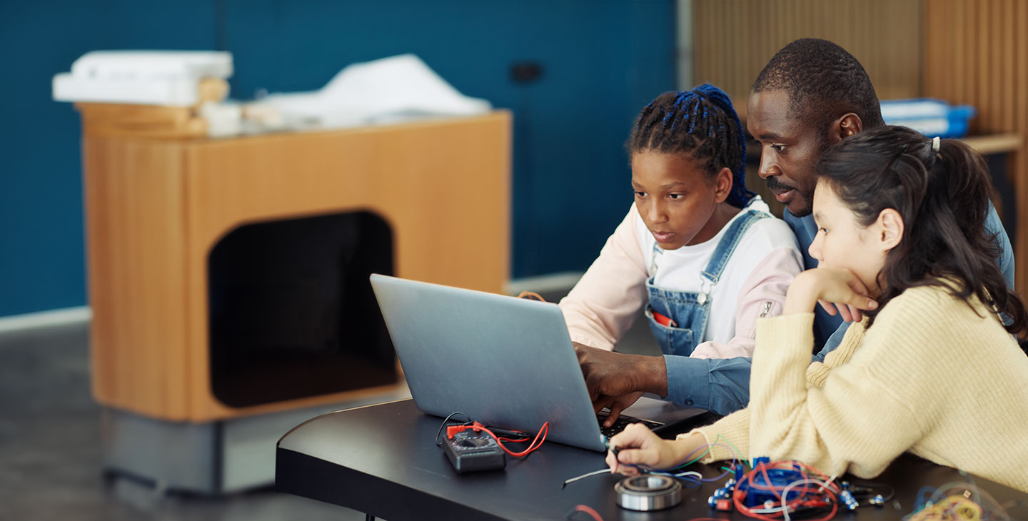 A Viasat volunteer  helping bridge the digital divide by connecting schoolchildren with online educational resources