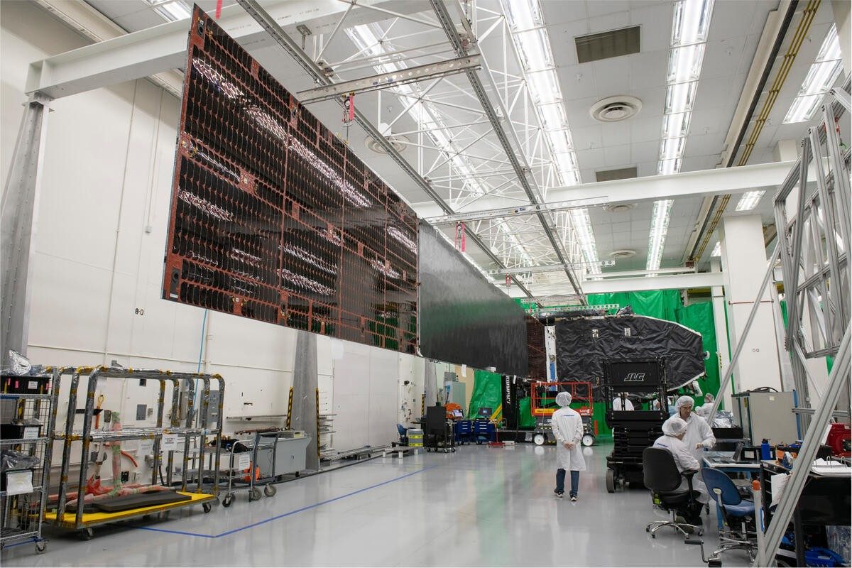 The first ViaSat-3 satellite receives one of its solar wings at Boeing’s El Segundo, CA facility.