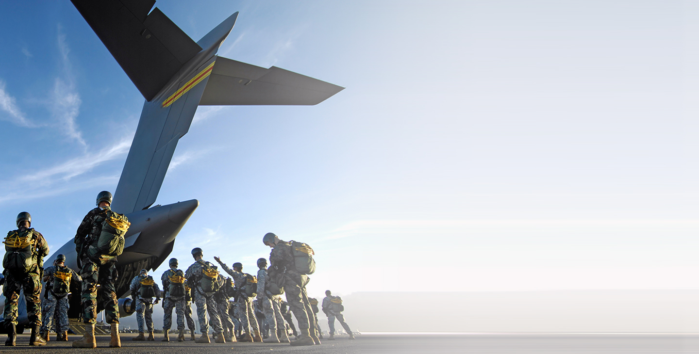 Paratroopers loading onto a C-17 aircraft