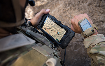 Soldier looking at end user device 