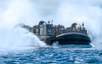 Military hovercraft at sea