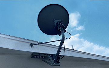An under-eave mount example with a Viasat satellite dish installation