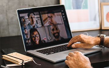Man video conferencing using Office Hours data.