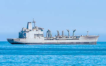 Military ship out at sea