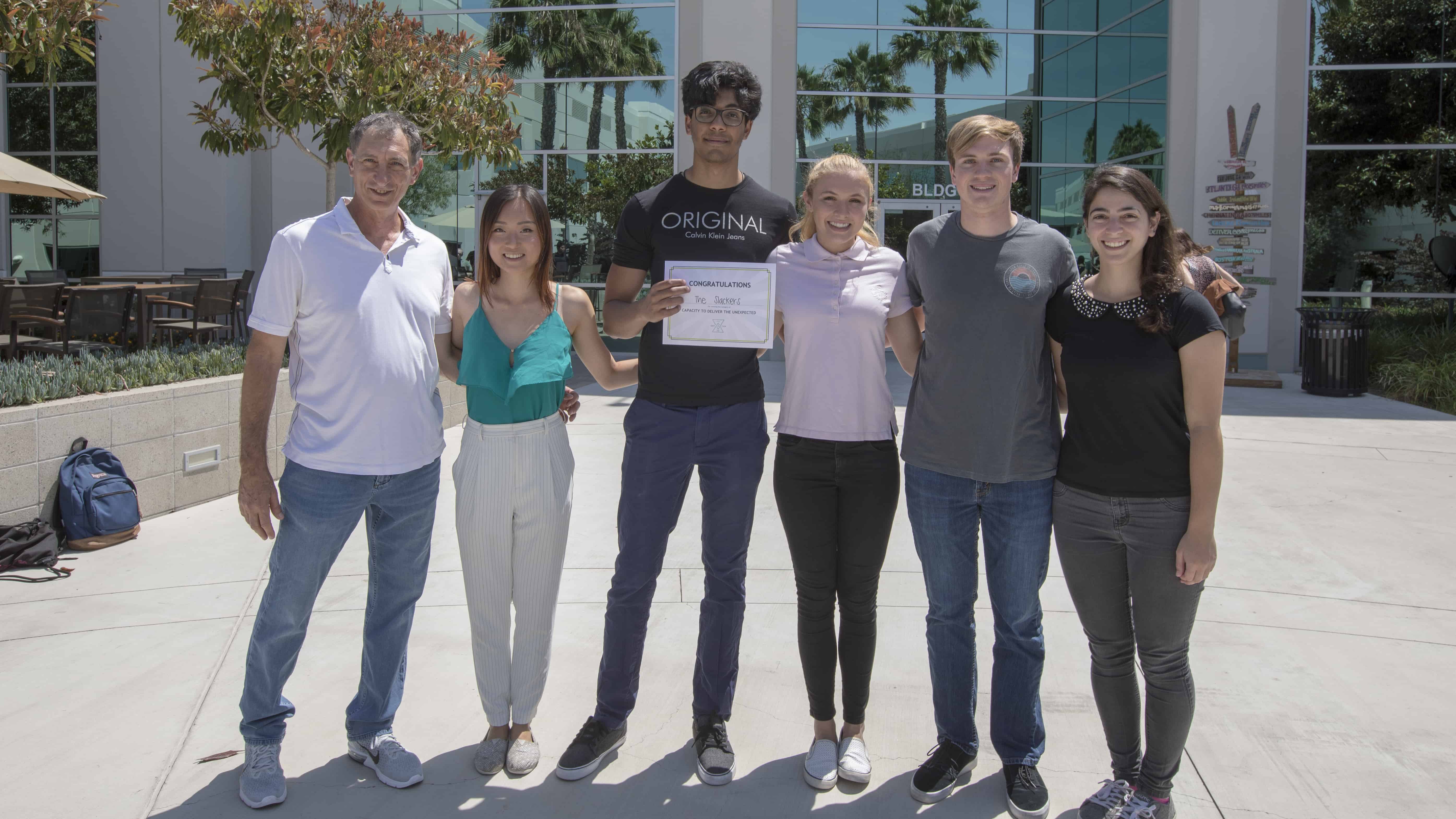Viasat CEO Mark Dankberg with hackathon winners
